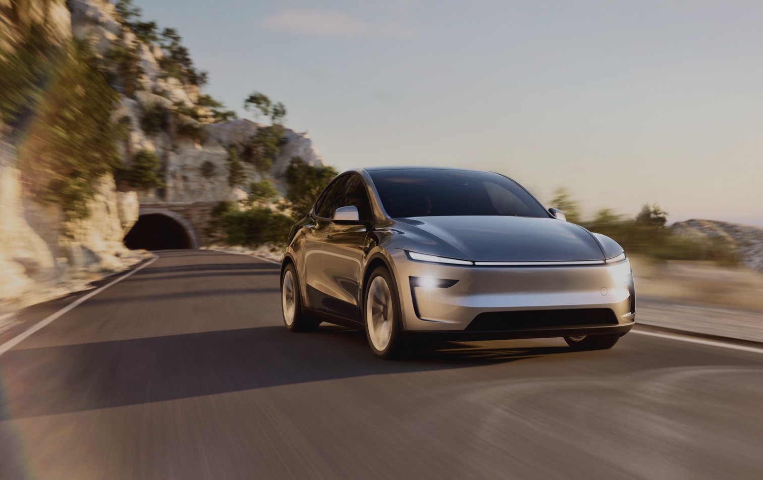 Tesla driving on a mountain road